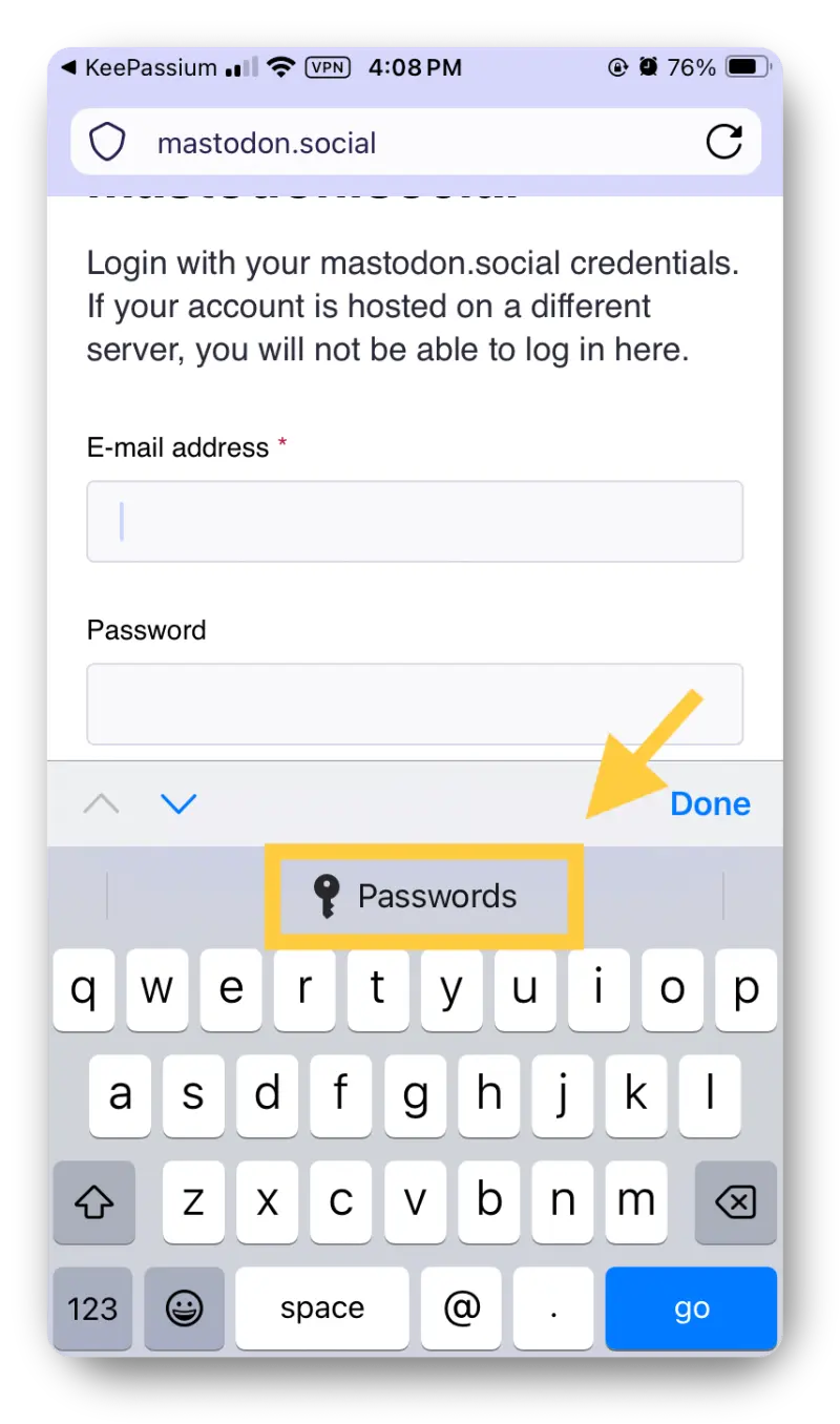 Screenshot from a mobile browser with the login page for mastodon.social displaying empty credential fields and iOS showing a "Passwords" button over the keyboard.